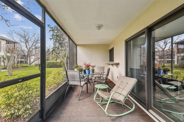 sunroom featuring a healthy amount of sunlight