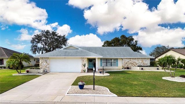 ranch-style home with a garage and a front yard