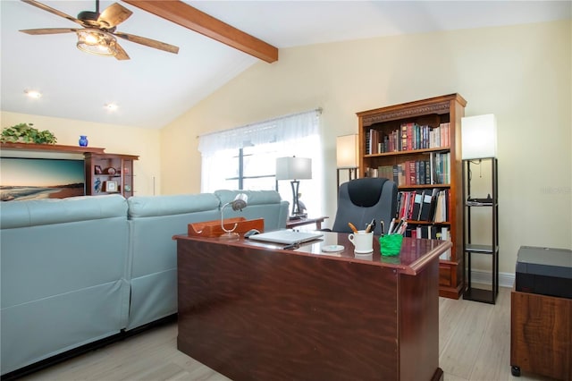 home office with light wood finished floors, lofted ceiling with beams, and ceiling fan