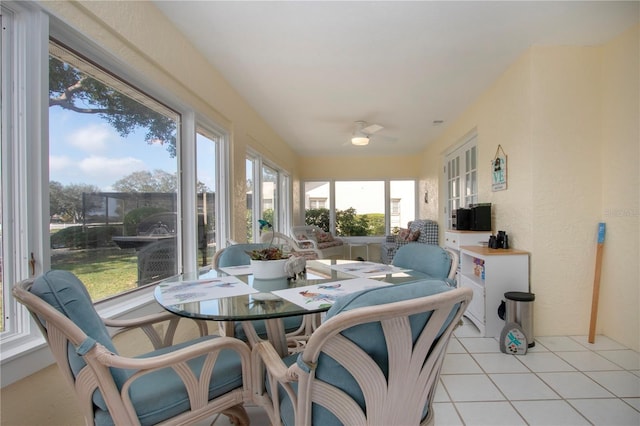 sunroom / solarium featuring tile patterned flooring