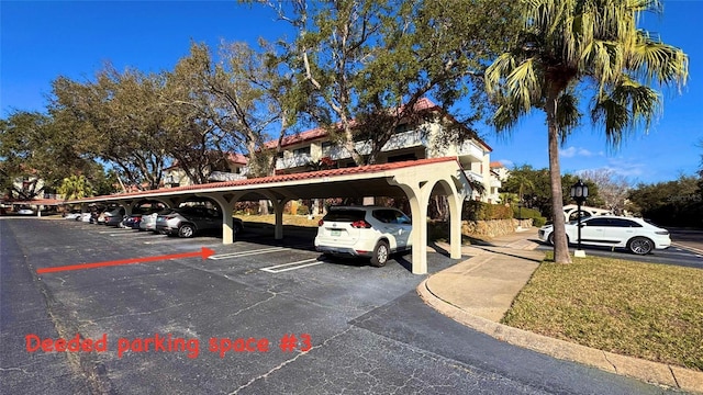 view of car parking featuring a carport