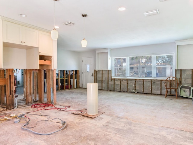 interior space featuring decorative light fixtures