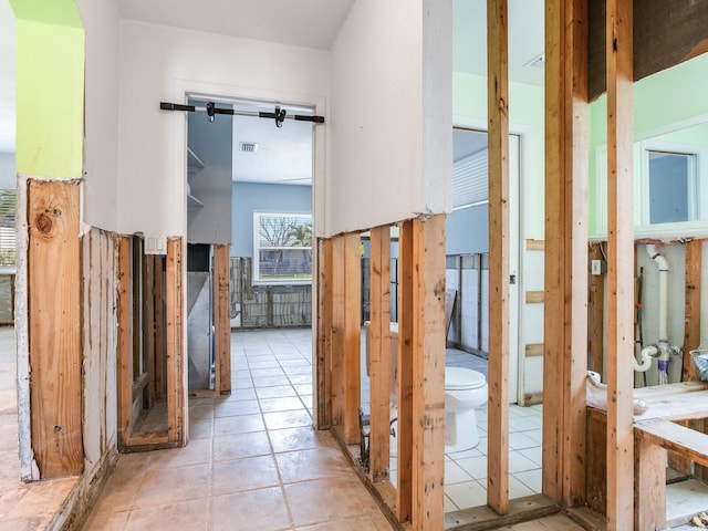 interior space featuring light tile patterned flooring