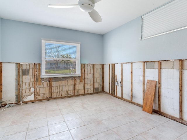 unfurnished room featuring ceiling fan