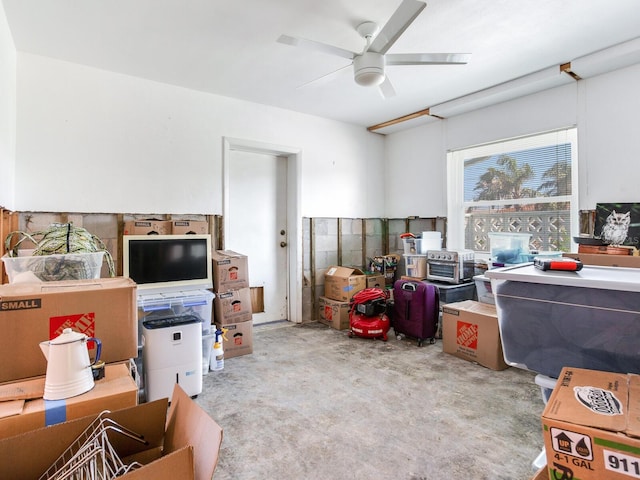 interior space featuring ceiling fan