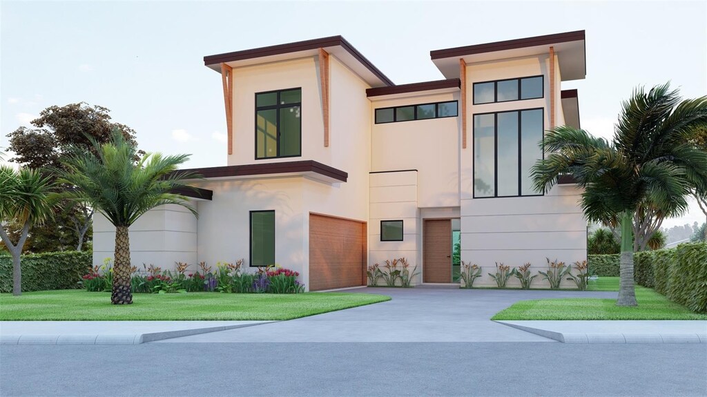 contemporary home with a garage and a front lawn