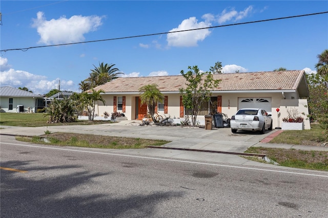 view of front of home featuring a garage