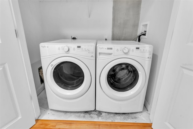 777 N Ashley Dr Unit 1915, Tampa, FL 33602 - clothes washing area with washing machine and dryer