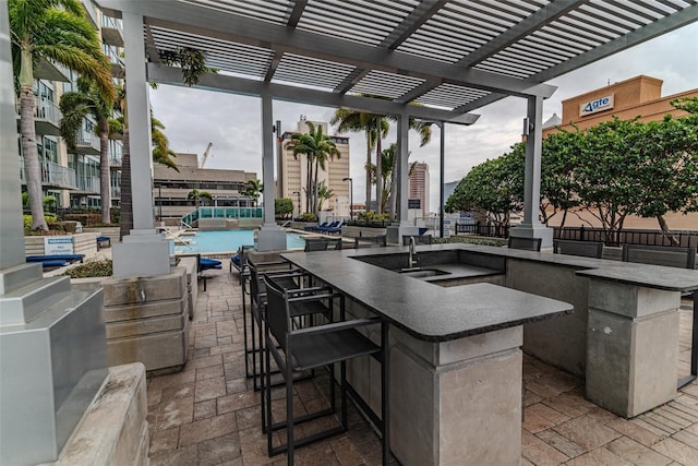 777 N Ashley Dr Unit 1915, Tampa, FL 33602 - view of patio with a pergola and an outdoor wet bar