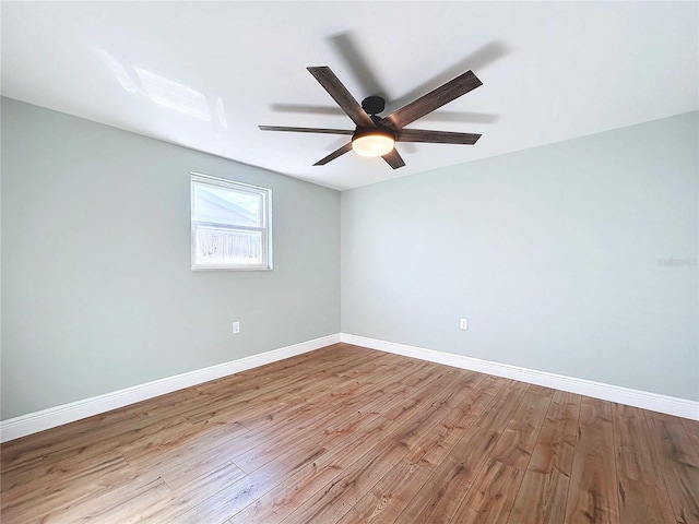 unfurnished room with light hardwood / wood-style flooring and ceiling fan