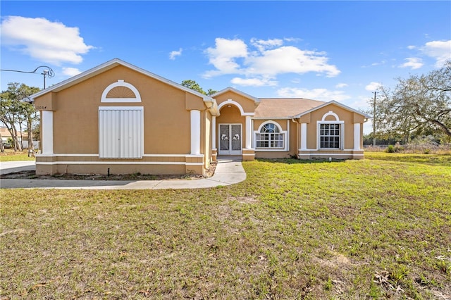 view of front of house with a front lawn