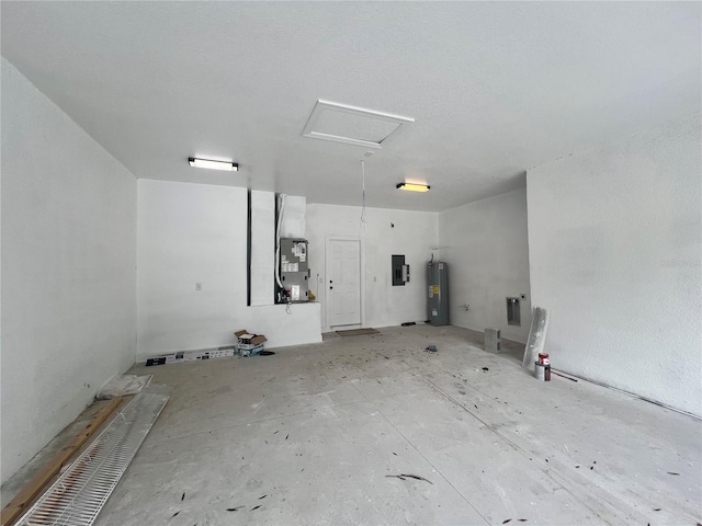 3413 N 72nd St, Tampa, FL 33619 - unfurnished room with electric panel, electric water heater, attic access, and heating unit