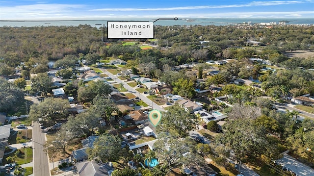 birds eye view of property featuring a water view and a residential view