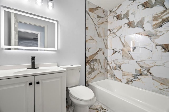 full bathroom featuring vanity, toilet, and tiled shower / bath combo