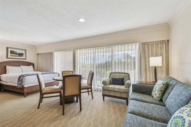 carpeted bedroom featuring crown molding and a textured ceiling