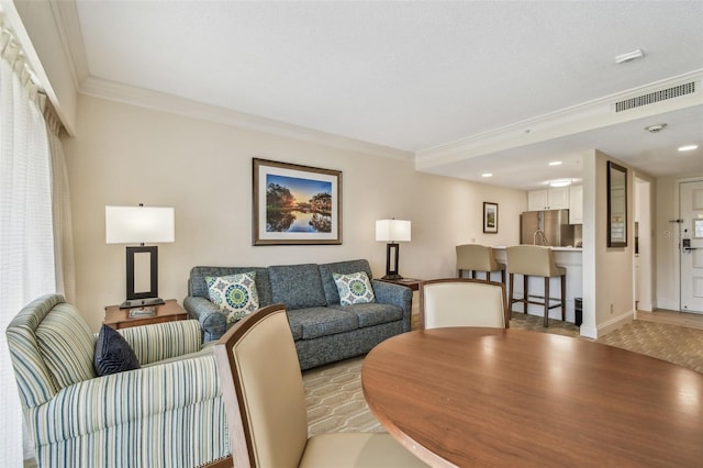 living room featuring ornamental molding