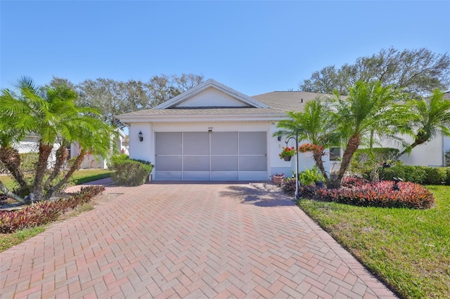 single story home with a garage