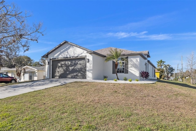 single story home featuring a garage, concrete driveway, a front yard, and stucco siding