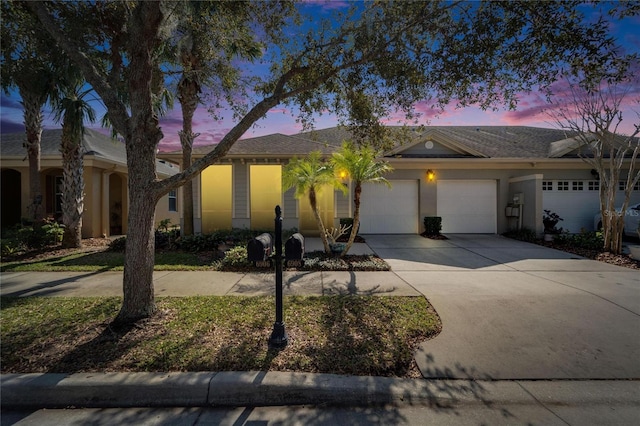 ranch-style home with a garage