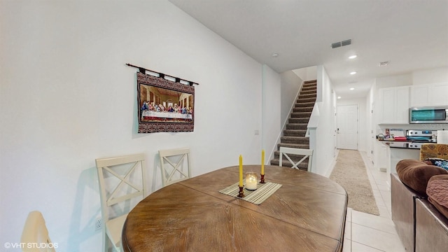 view of tiled dining space