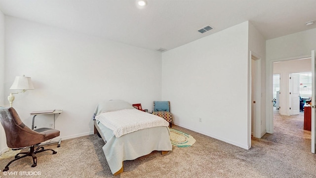 bedroom featuring carpet