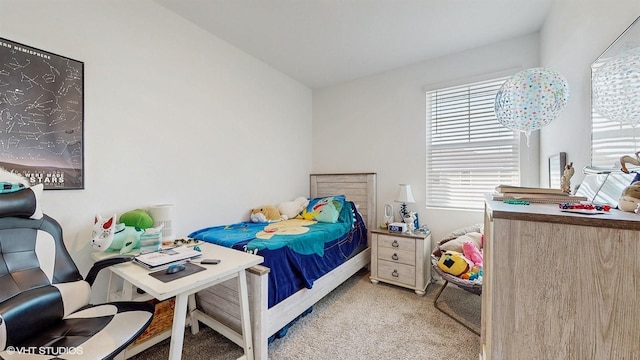 bedroom with light carpet