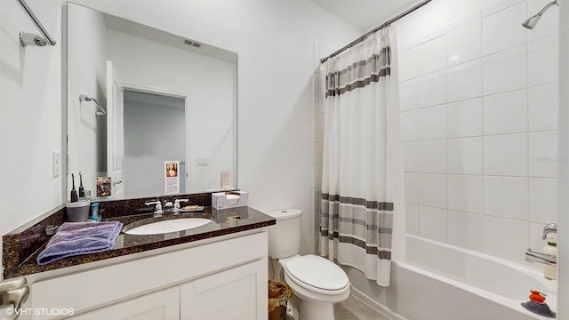 full bathroom featuring vanity, toilet, and shower / bath combo