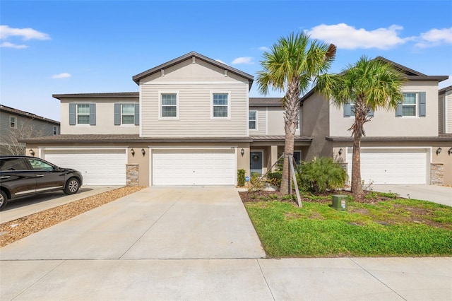 view of front of property with a garage