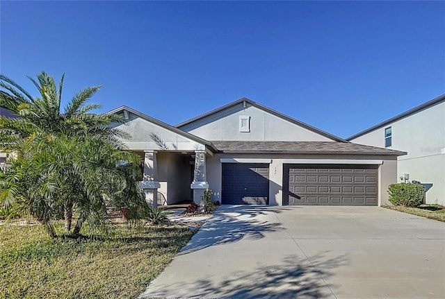 view of front of home with a garage