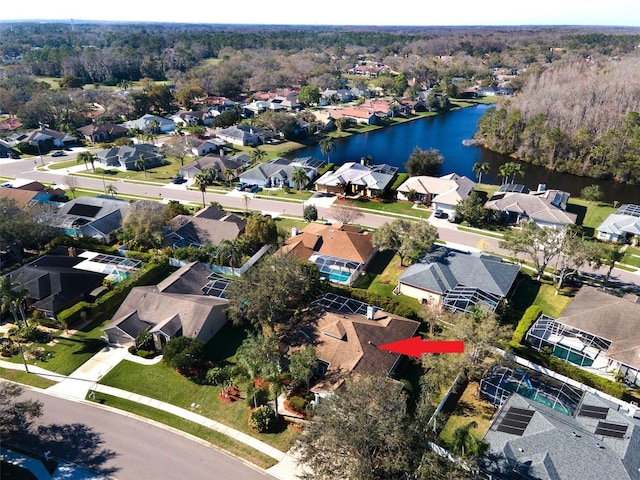 aerial view with a residential view and a water view