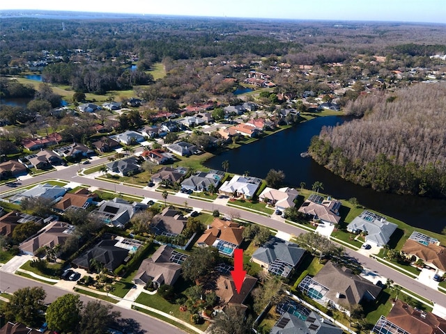 aerial view featuring a residential view and a water view