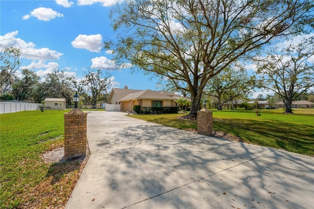 ranch-style home with a front yard