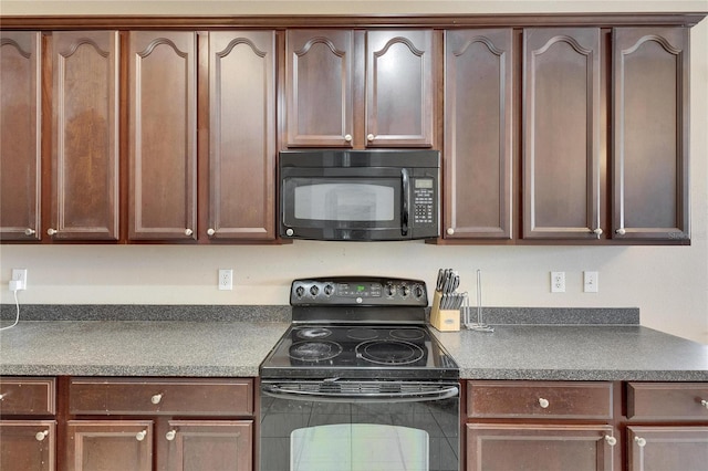 kitchen with black appliances