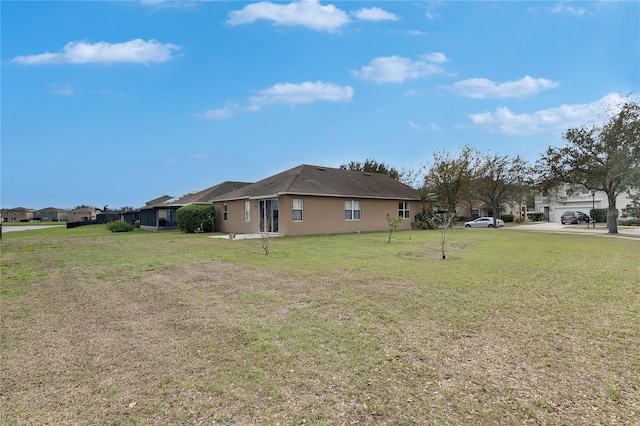 exterior space with a lawn