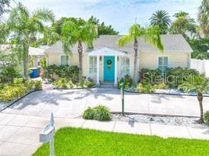 view of front of home with a front yard