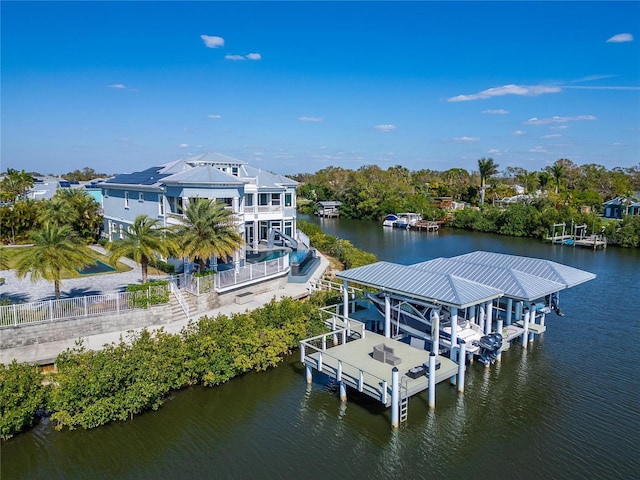 view of dock with a water view and boat lift