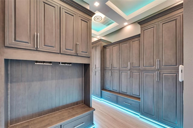 mudroom with light wood finished floors