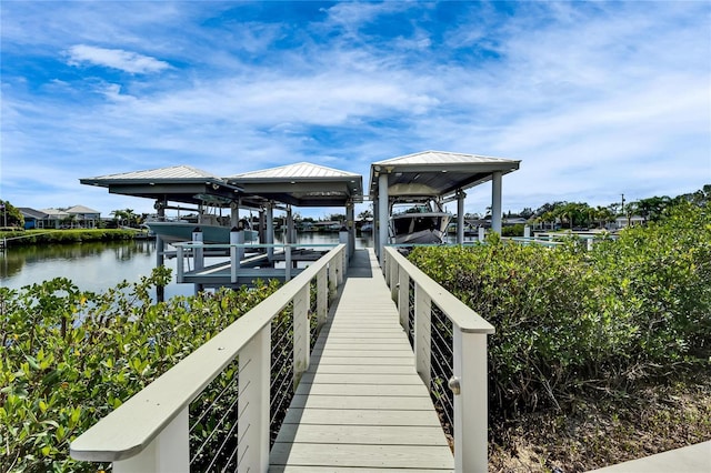 dock area featuring a water view