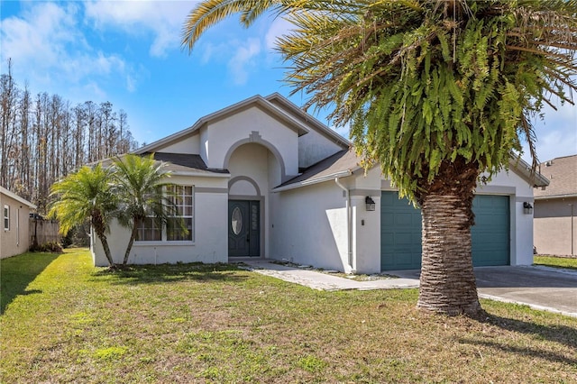 view of front facade featuring a garage and a front lawn