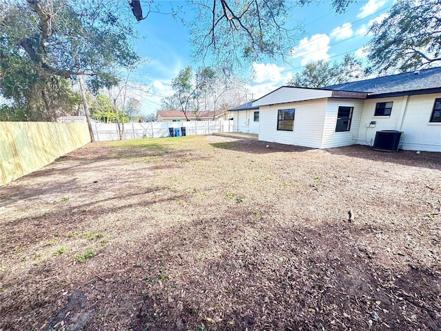 view of yard featuring central AC unit