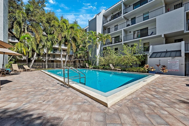 105 4th Ave NE Unit 418, Saint Petersburg, FL 33701 - view of swimming pool featuring a patio