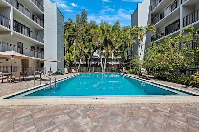 105 4th Ave NE Unit 418, Saint Petersburg, FL 33701 - view of swimming pool featuring a patio