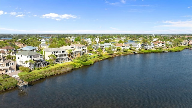bird's eye view featuring a residential view and a water view