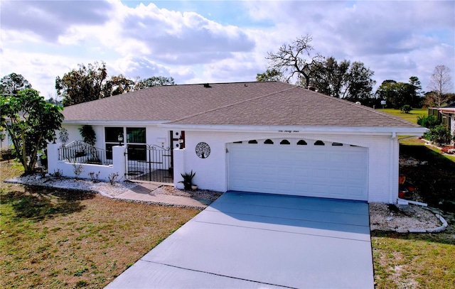 single story home with an attached garage, a shingled roof, concrete driveway, and brick siding