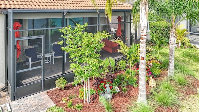 exterior space with a sunroom