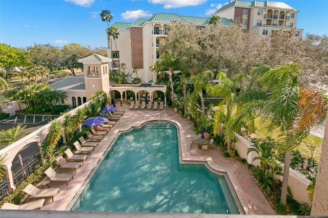 view of swimming pool featuring a patio area