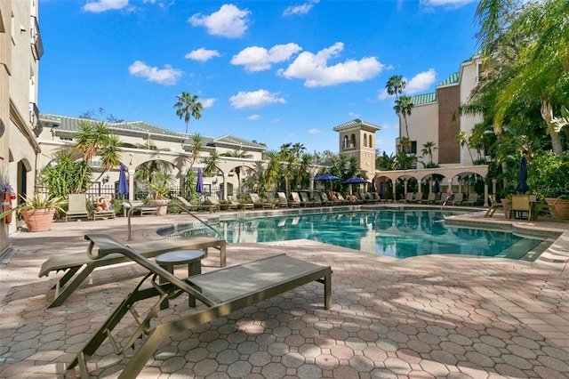 view of pool featuring a patio