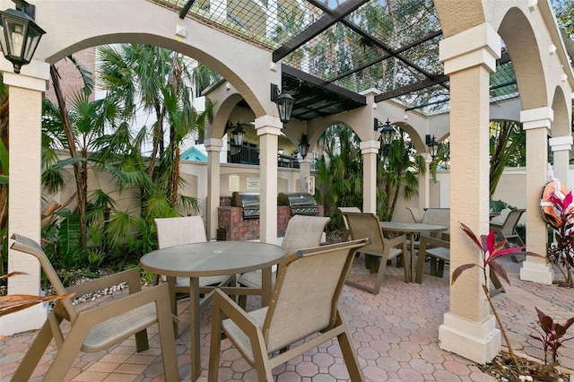 view of patio / terrace with an outdoor kitchen and area for grilling