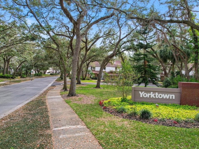 surrounding community with a yard