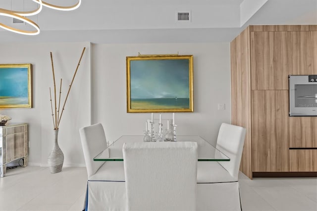 dining room with light tile patterned floors